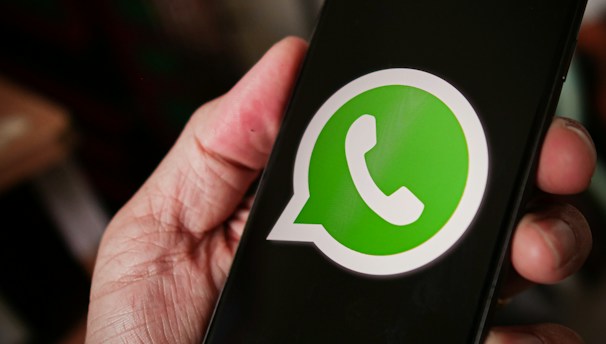 A user uploading a photo to a Telegram bot on a mobile device.